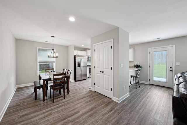 140 Peaceful Lndg, Georgetown, KY 40324 - dining space with wood finished floors, healthy amount of natural light, and recessed lighting