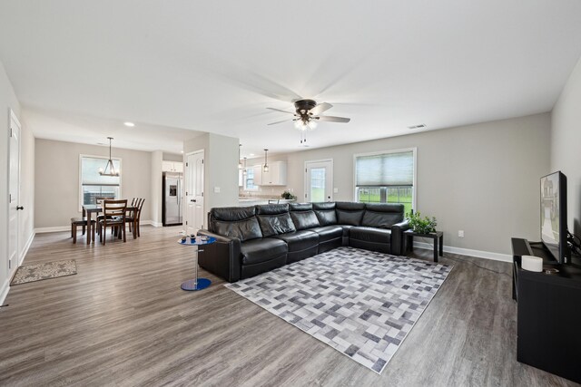 140 Peaceful Lndg, Georgetown, KY 40324 - living area with wood finished floors, a ceiling fan, baseboards, and plenty of natural light