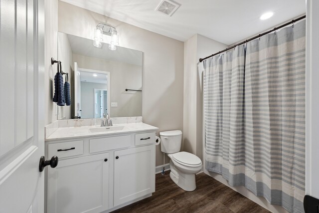 140 Peaceful Lndg, Georgetown, KY 40324 - full bath featuring wood finished floors, toilet, vanity, and a shower with shower curtain