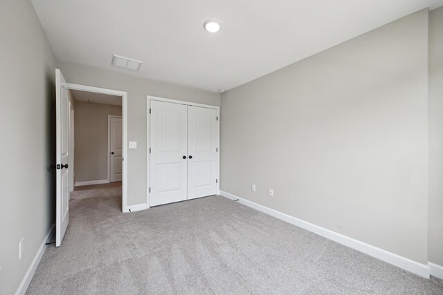 140 Peaceful Lndg, Georgetown, KY 40324 - unfurnished bedroom featuring baseboards, light colored carpet, and a closet