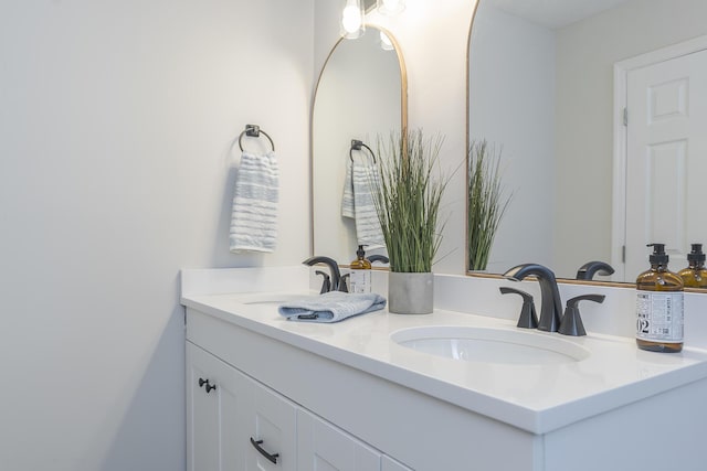 bathroom with double vanity