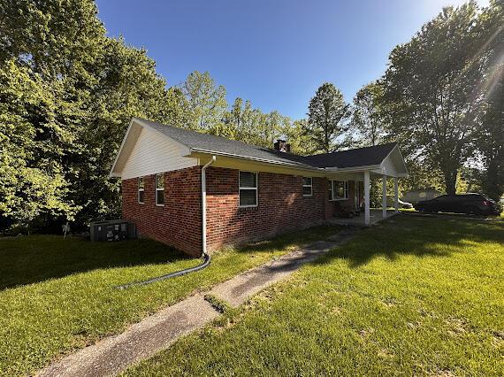 4216 N Ky 11, Cannon, KY 40923 - view of side of property featuring a yard and brick siding