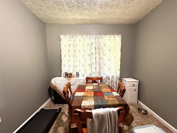 4216 N Ky 11, Cannon, KY 40923 - dining space with a textured ceiling and baseboards