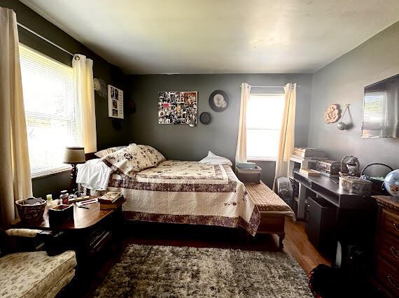 4216 N Ky 11, Cannon, KY 40923 - bedroom with multiple windows and wood finished floors