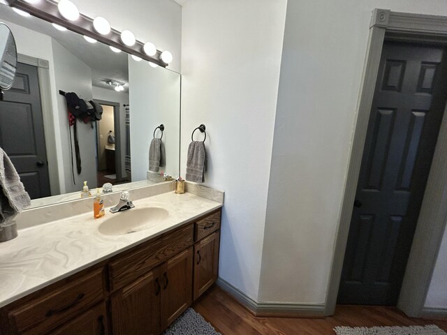 296 Ferry Rd, Somerset, KY 42503 - bathroom with wood finished floors, vanity, and baseboards