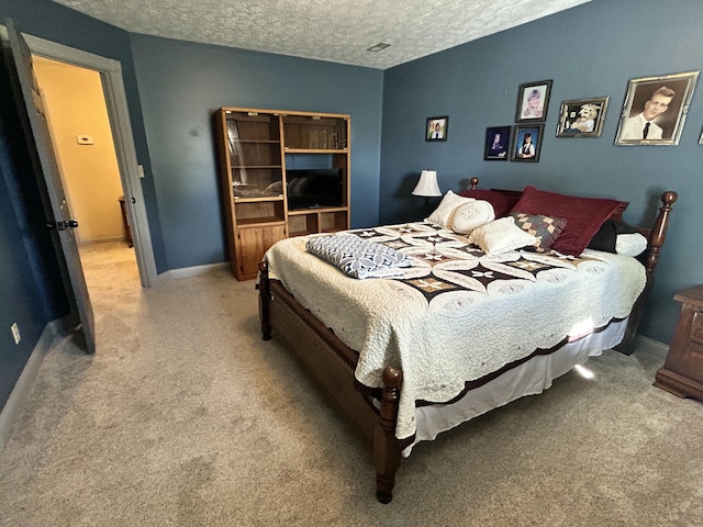 296 Ferry Rd, Somerset, KY 42503 - bedroom featuring light colored carpet, a textured ceiling, and baseboards