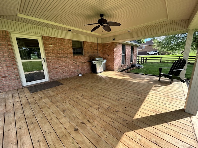 296 Ferry Rd, Somerset, KY 42503 - wooden terrace featuring grilling area, ceiling fan, and a lawn