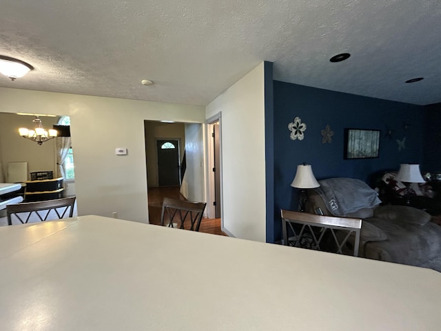 296 Ferry Rd, Somerset, KY 42503 - bedroom featuring a textured ceiling and a chandelier