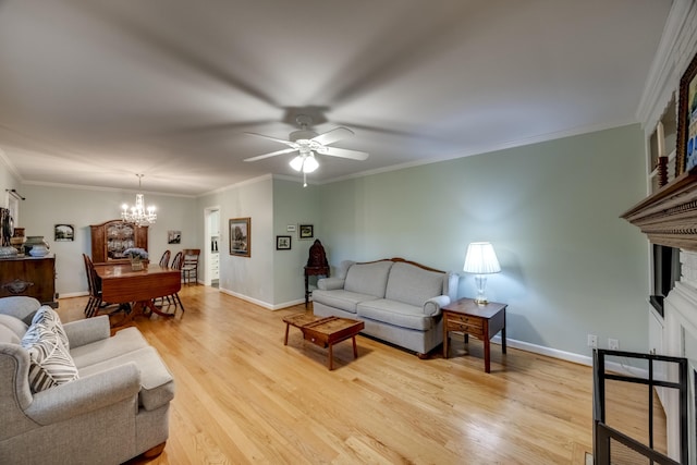 445 Cecilian Ter, Danville, KY 40422 - living room featuring a chandelier, light wood-style flooring, crown molding, ceiling fan, and baseboards