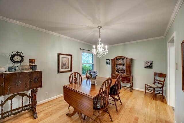 445 Cecilian Ter, Danville, KY 40422 - dining area with a chandelier, light wood-style flooring, crown molding, and baseboards