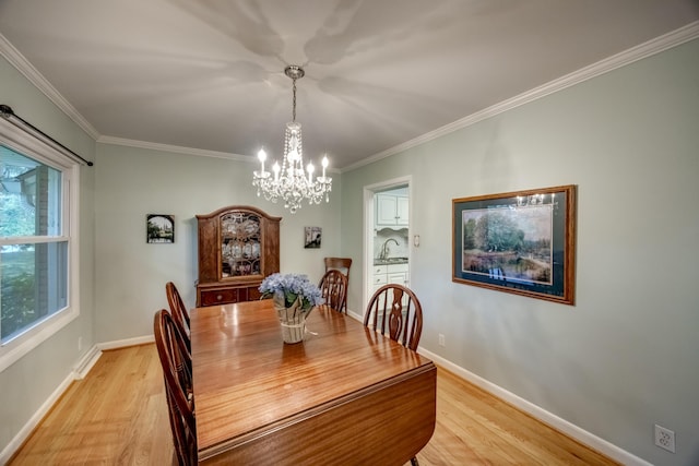 445 Cecilian Ter, Danville, KY 40422 - dining room featuring a chandelier, light wood-style floors, crown molding, and baseboards