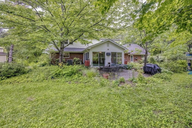 445 Cecilian Ter, Danville, KY 40422 - back of property with a patio area, central AC, and brick siding