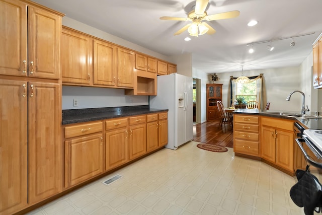 240 Percheron Dr, Richmond, KY 40475 - kitchen with white fridge with ice dispenser, a sink, light flooring, a ceiling fan, and dark countertops
