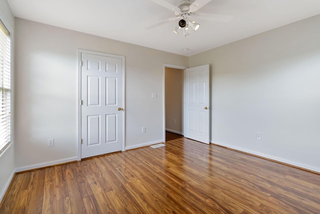 240 Percheron Dr, Richmond, KY 40475 - unfurnished bedroom with baseboards, wood finished floors, and ceiling fan