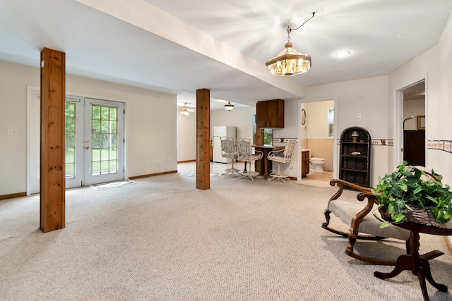 240 Percheron Dr, Richmond, KY 40475 - living room with light carpet, baseboards, and french doors