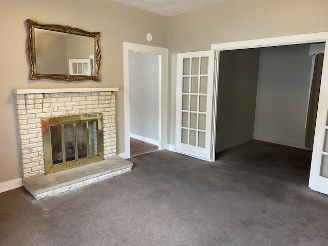 27 Oliver St, Winchester, KY 40391 - unfurnished living room with carpet floors, a fireplace, and baseboards