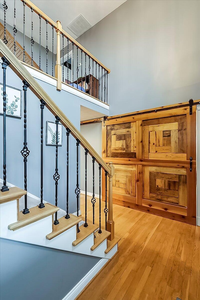 835 Isaac Shelby Cir, Frankfort, KY 40601 - stairway featuring hardwood / wood-style floors