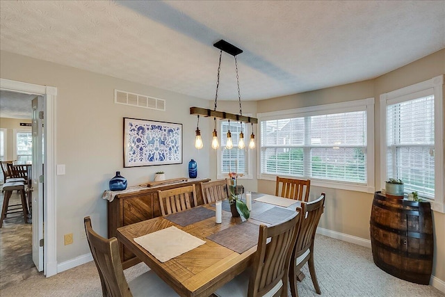 835 Isaac Shelby Cir, Frankfort, KY 40601 - dining area with baseboards and light carpet