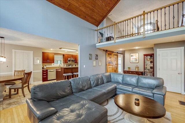 835 Isaac Shelby Cir, Frankfort, KY 40601 - living area with wood ceiling, light wood-type flooring, and high vaulted ceiling