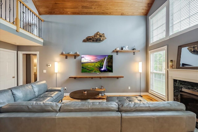 835 Isaac Shelby Cir, Frankfort, KY 40601 - living room featuring wooden ceiling, baseboards, high vaulted ceiling, wood finished floors, and a high end fireplace