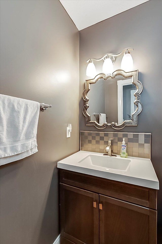 835 Isaac Shelby Cir, Frankfort, KY 40601 - bathroom with backsplash, vanity, and baseboards