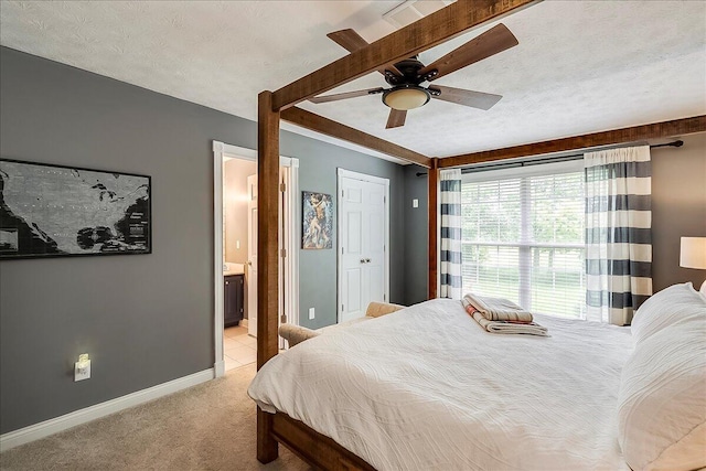 835 Isaac Shelby Cir, Frankfort, KY 40601 - bedroom with light carpet, baseboards, connected bathroom, ceiling fan, and a textured ceiling
