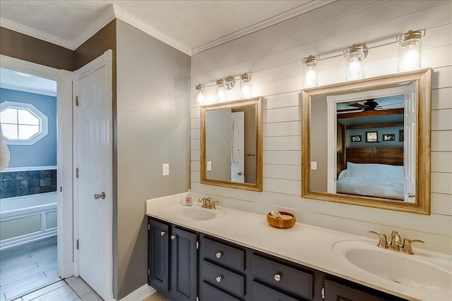 835 Isaac Shelby Cir, Frankfort, KY 40601 - bathroom featuring ornamental molding, double vanity, tile patterned floors, ceiling fan, and ensuite bathroom