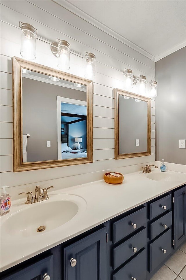 835 Isaac Shelby Cir, Frankfort, KY 40601 - bathroom featuring double vanity, crown molding, tile patterned floors, and connected bathroom