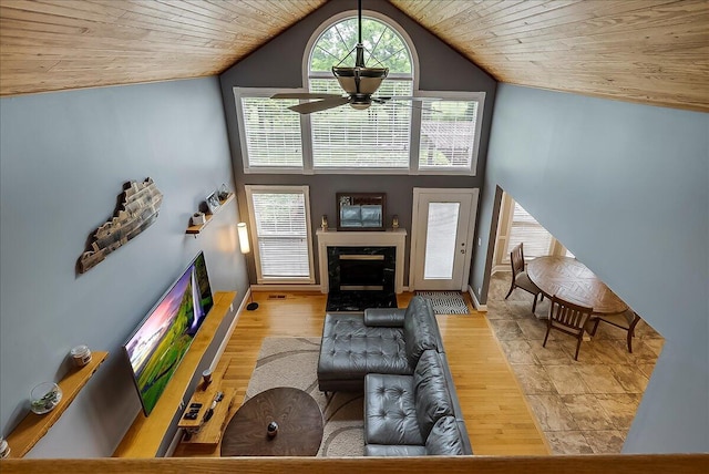835 Isaac Shelby Cir, Frankfort, KY 40601 - living area with a ceiling fan, a fireplace, lofted ceiling, wooden ceiling, and plenty of natural light