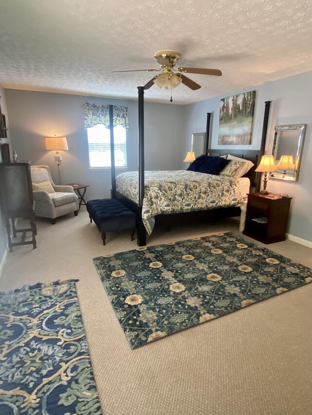 45 Rons Pond Rd, Corbin, KY 40701 - bedroom with carpet floors, a textured ceiling, ceiling fan, and baseboards