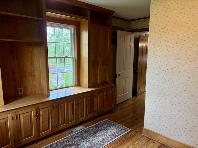 1439 Stanford St, Lancaster, KY 40444 - hall featuring wallpapered walls, light wood-type flooring, and baseboards