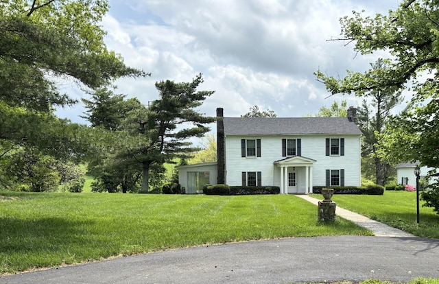 1439 Stanford St, Lancaster, KY 40444 - colonial-style house with a chimney and a front lawn