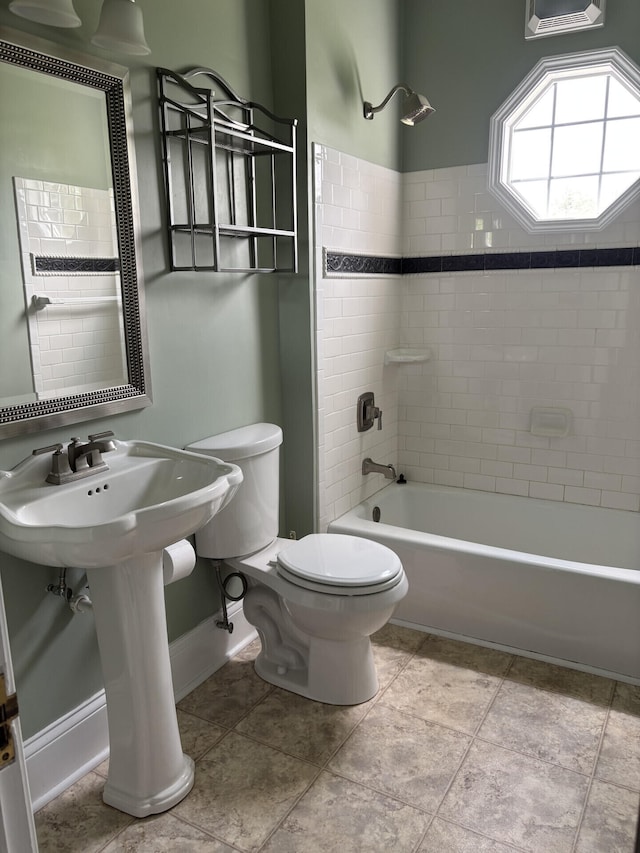 1439 Stanford St, Lancaster, KY 40444 - full bath featuring toilet, shower / washtub combination, and baseboards