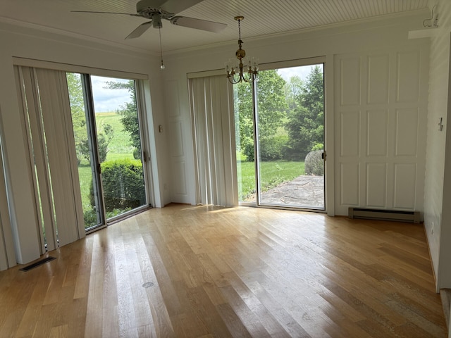 1439 Stanford St, Lancaster, KY 40444 - unfurnished dining area with a baseboard radiator, ceiling fan, ornamental molding, wood finished floors, and a chandelier