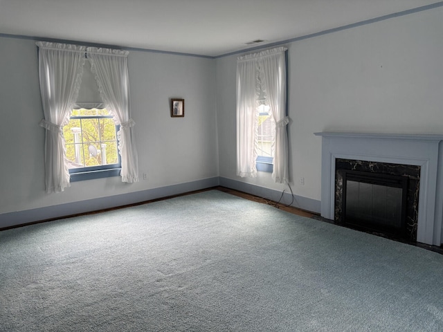 1439 Stanford St, Lancaster, KY 40444 - unfurnished living room featuring healthy amount of natural light, a fireplace, baseboards, ornamental molding, and carpet