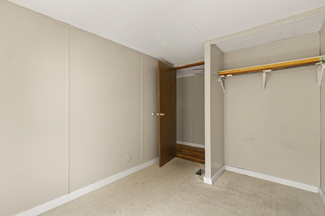 3145 Lily Rd, London, KY 40744 - unfurnished bedroom with light colored carpet and a closet