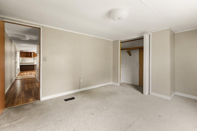 3145 Lily Rd, London, KY 40744 - unfurnished bedroom featuring carpet flooring, a closet, and baseboards