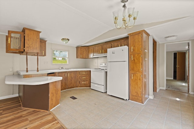 3145 Lily Rd, London, KY 40744 - kitchen with white appliances, under cabinet range hood, brown cabinetry, a peninsula, and light countertops