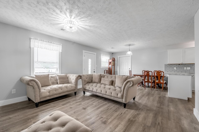 524 Joel St, Lexington, KY 40508 - living room with light wood-style flooring and a textured ceiling
