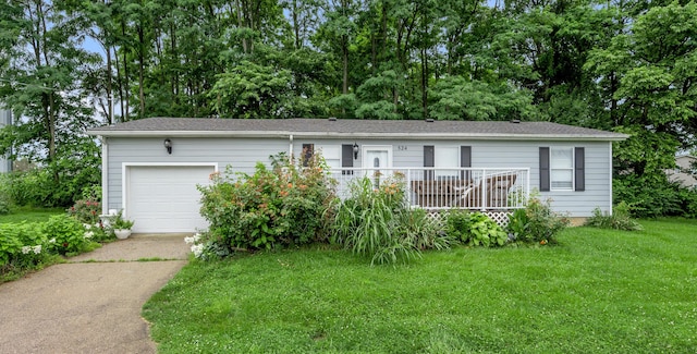 524 Joel St, Lexington, KY 40508 - ranch-style house featuring concrete driveway, an attached garage, and a front lawn