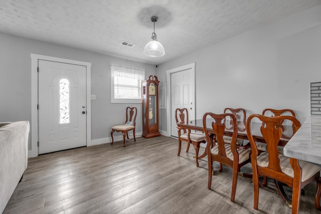 524 Joel St, Lexington, KY 40508 - dining room with a textured ceiling and wood finished floors
