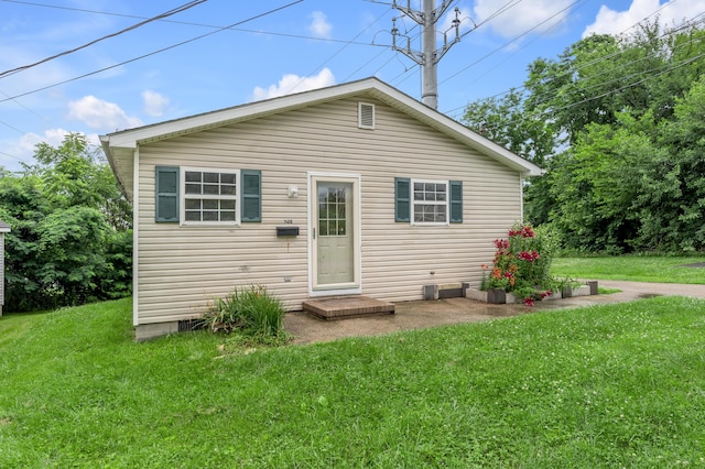 529 Joel St, Lexington, KY 40508 - rear view of house with a yard