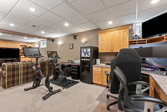 home office featuring light colored carpet, recessed lighting, and a paneled ceiling
