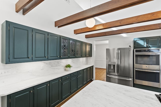 701 Old Dobbin Rd, Lexington, KY 40502 - kitchen featuring appliances with stainless steel finishes, beam ceiling, backsplash, wood finished floors, and light stone counters