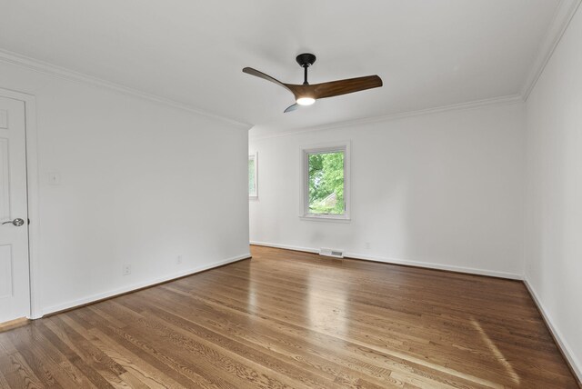 701 Old Dobbin Rd, Lexington, KY 40502 - empty room with a ceiling fan, crown molding, wood finished floors, and baseboards