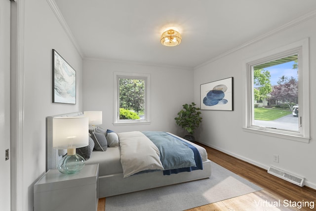 701 Old Dobbin Rd, Lexington, KY 40502 - bedroom featuring crown molding, wood finished floors, and baseboards