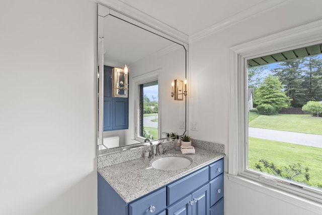 701 Old Dobbin Rd, Lexington, KY 40502 - bathroom featuring healthy amount of natural light, ornamental molding, vanity, and toilet
