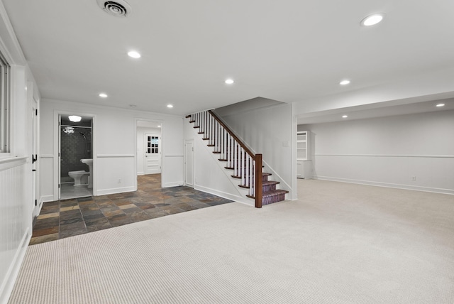 701 Old Dobbin Rd, Lexington, KY 40502 - finished below grade area with stairs, stone finish flooring, recessed lighting, and baseboards