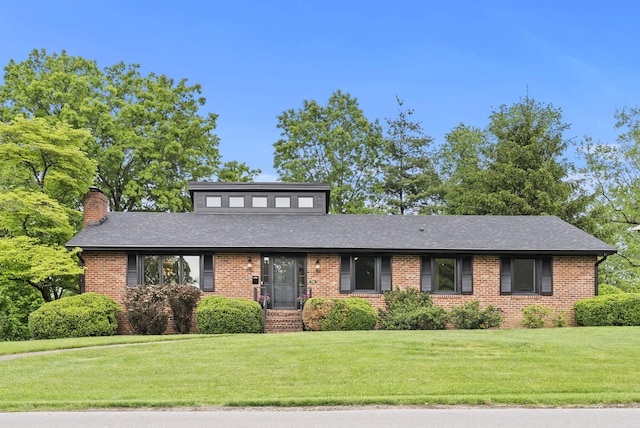701 Old Dobbin Rd, Lexington, KY 40502 - mid-century home with a chimney, brick siding, and a front lawn