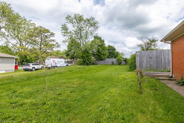 view of yard with fence